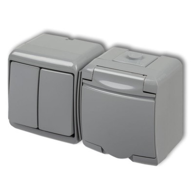 10WGHH-2p Łącznik świecznikowy z gniazdem pojedynczym z uziemieniem 2P+Z (klapka popielata, przesłony torów prądowych) Popielaty